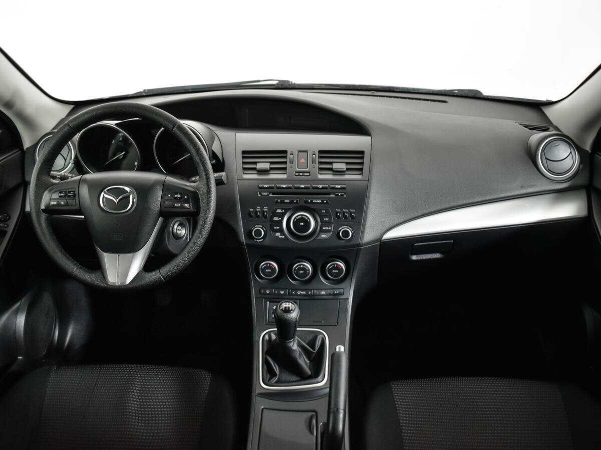 Mazda 3 с пробегом — 2012 год. Фото: #11