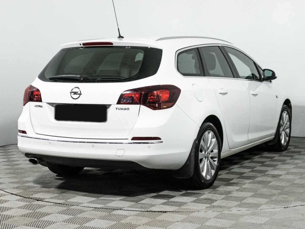 Opel Astra с пробегом — 2014 год. Фото: #4