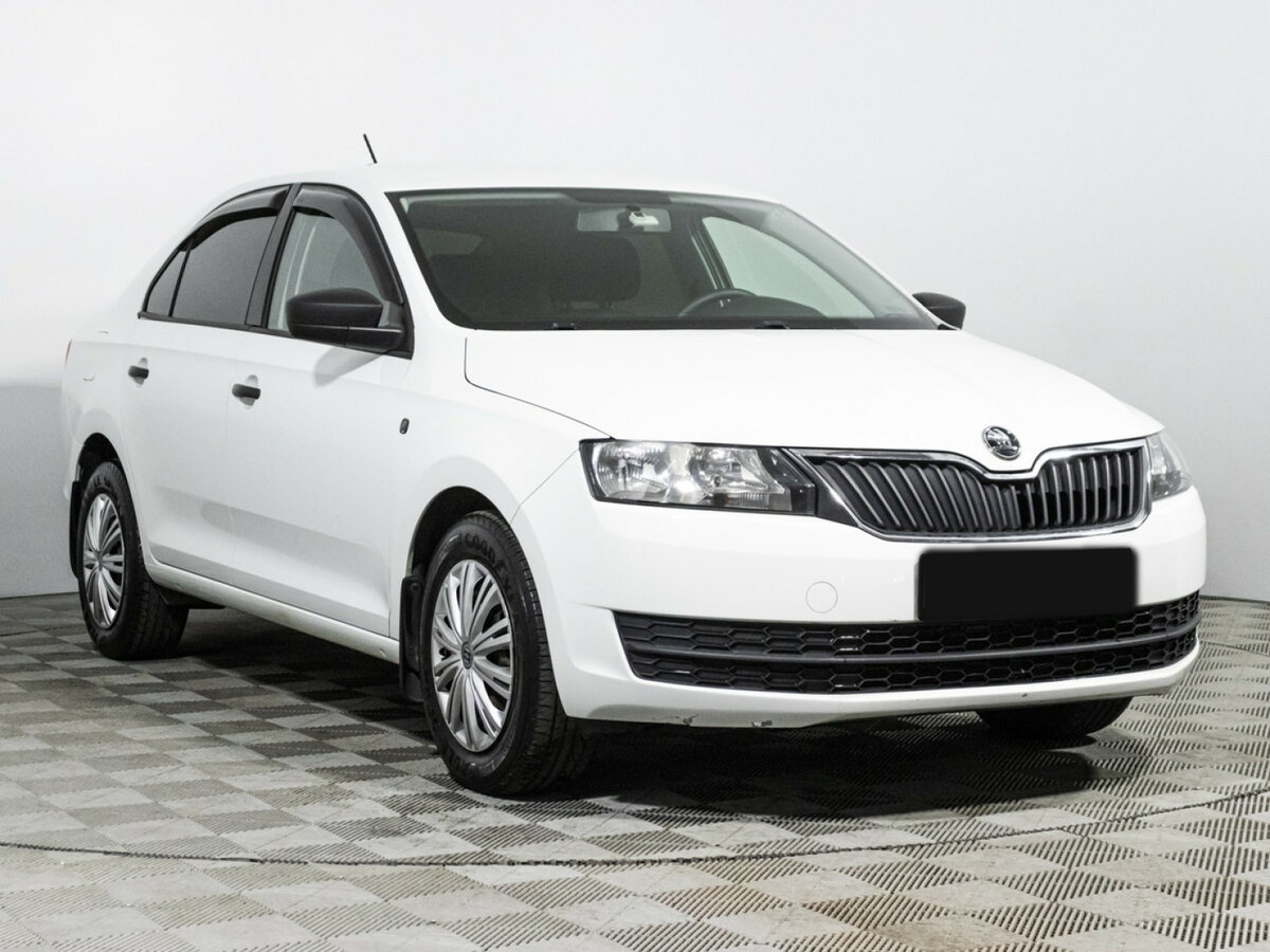 Skoda Rapid с пробегом — 2015 год. Фото: #2