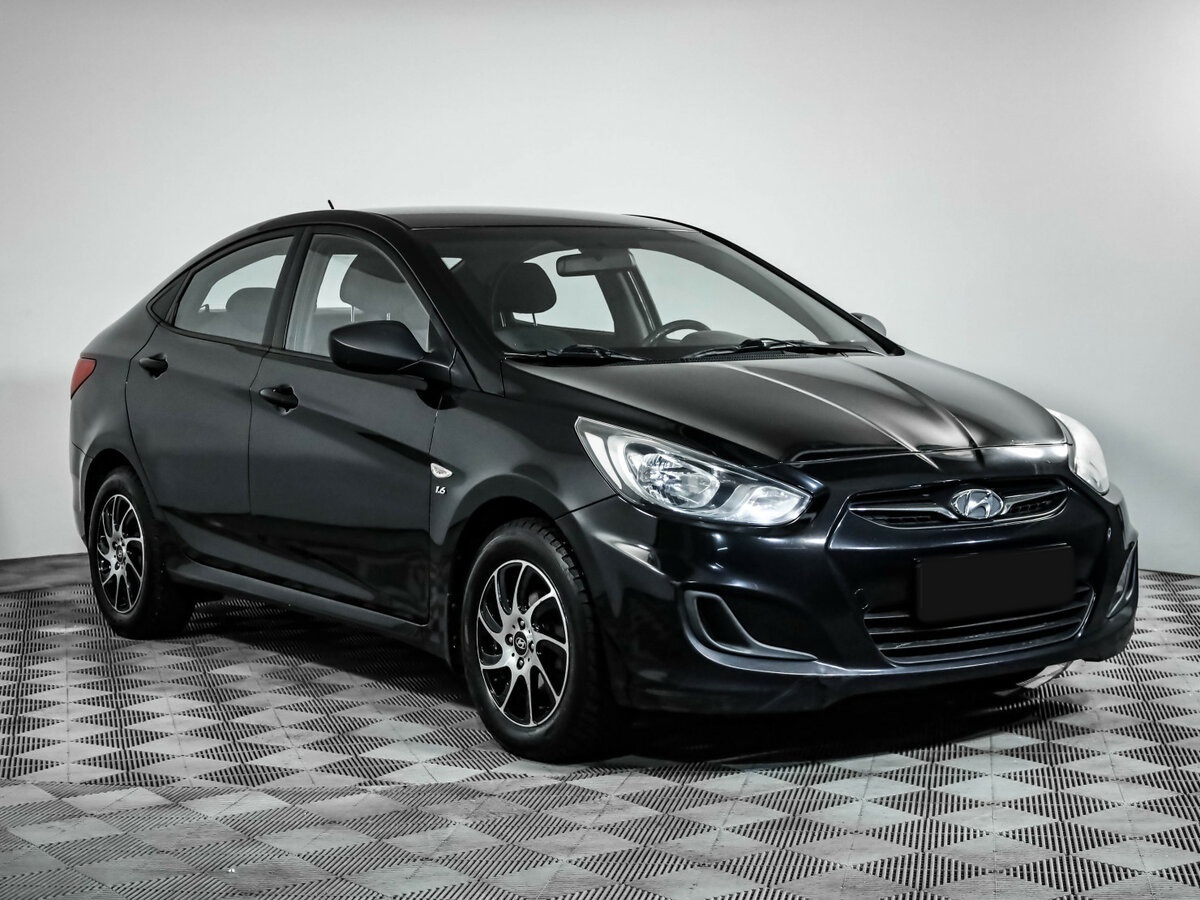 Hyundai Solaris с пробегом — 2013 год. Фото: #2